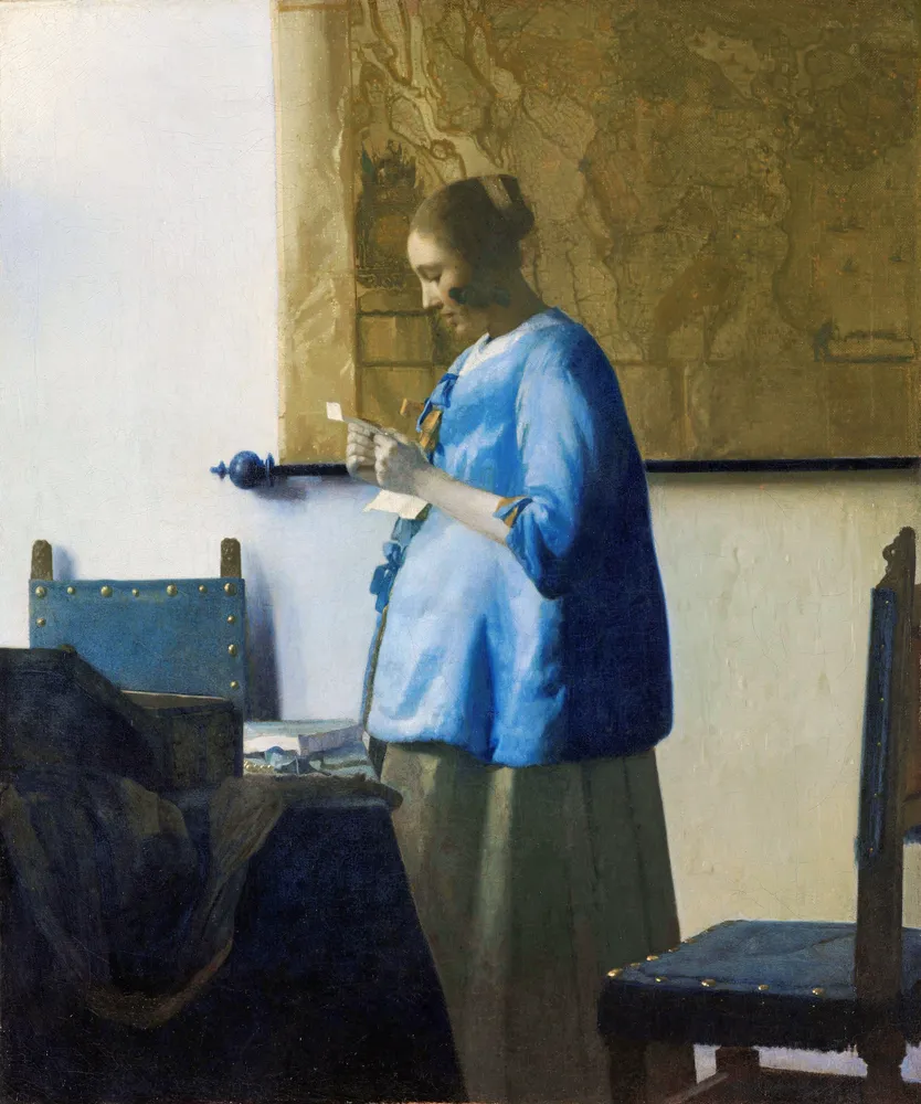 Woman Reading a Letter (c. 1663) by Johannes Vermeer