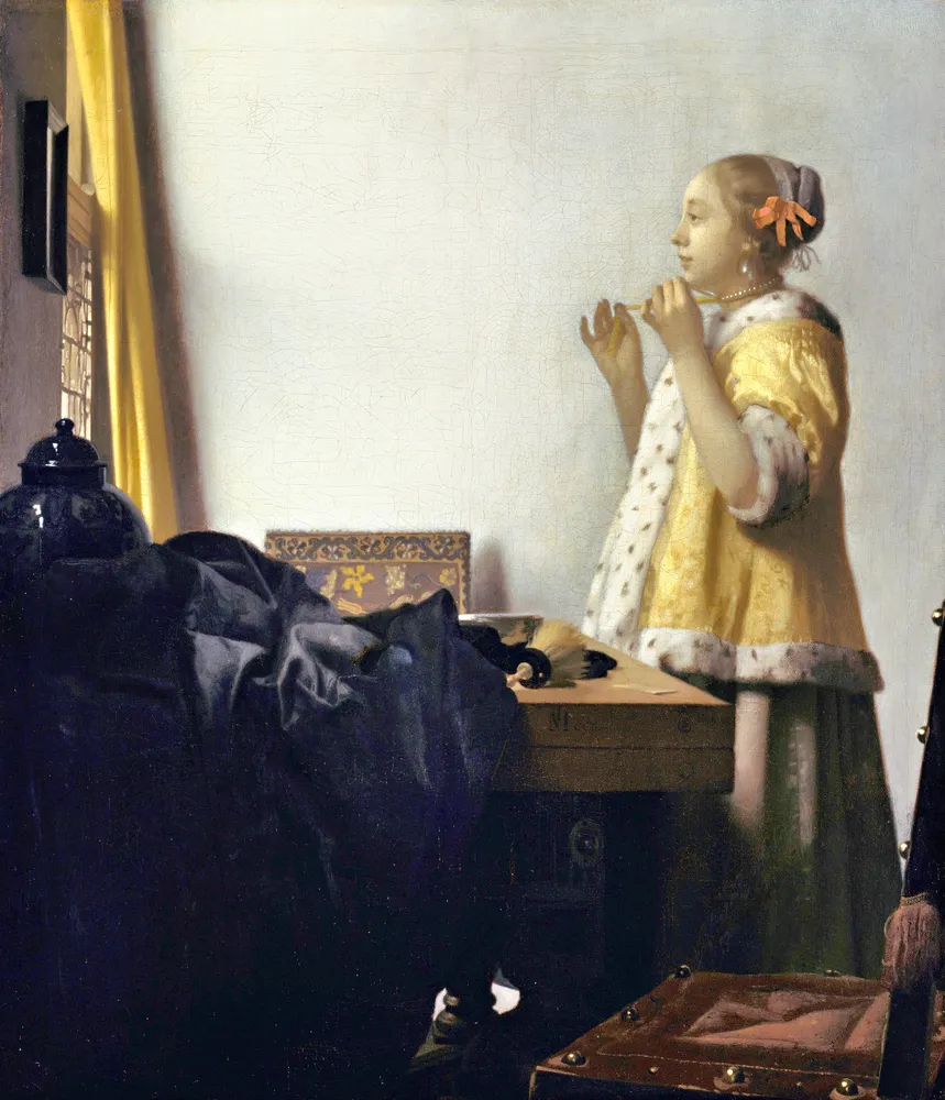 Young Woman with a Pearl Necklace (from 1663 until 1665) by Johannes Vermeer